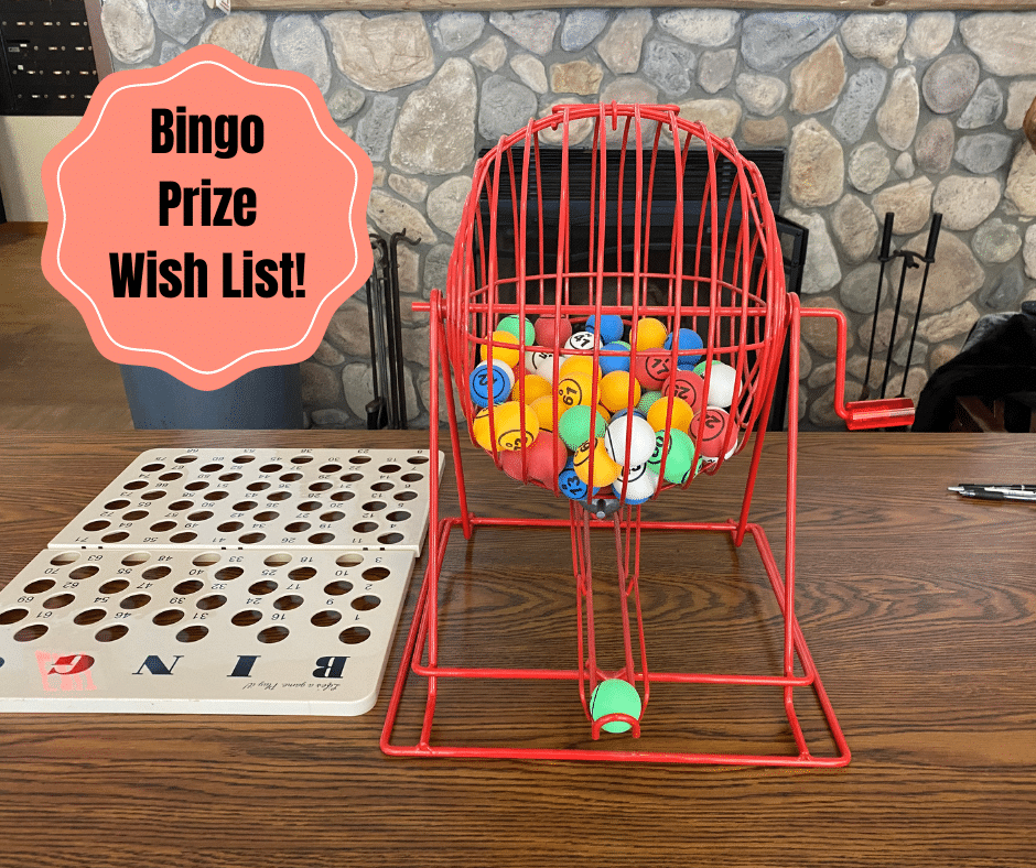 Photograph of a bingo cage set on a table. Pink wavy circle with the text: Bingo Prize Wish List!